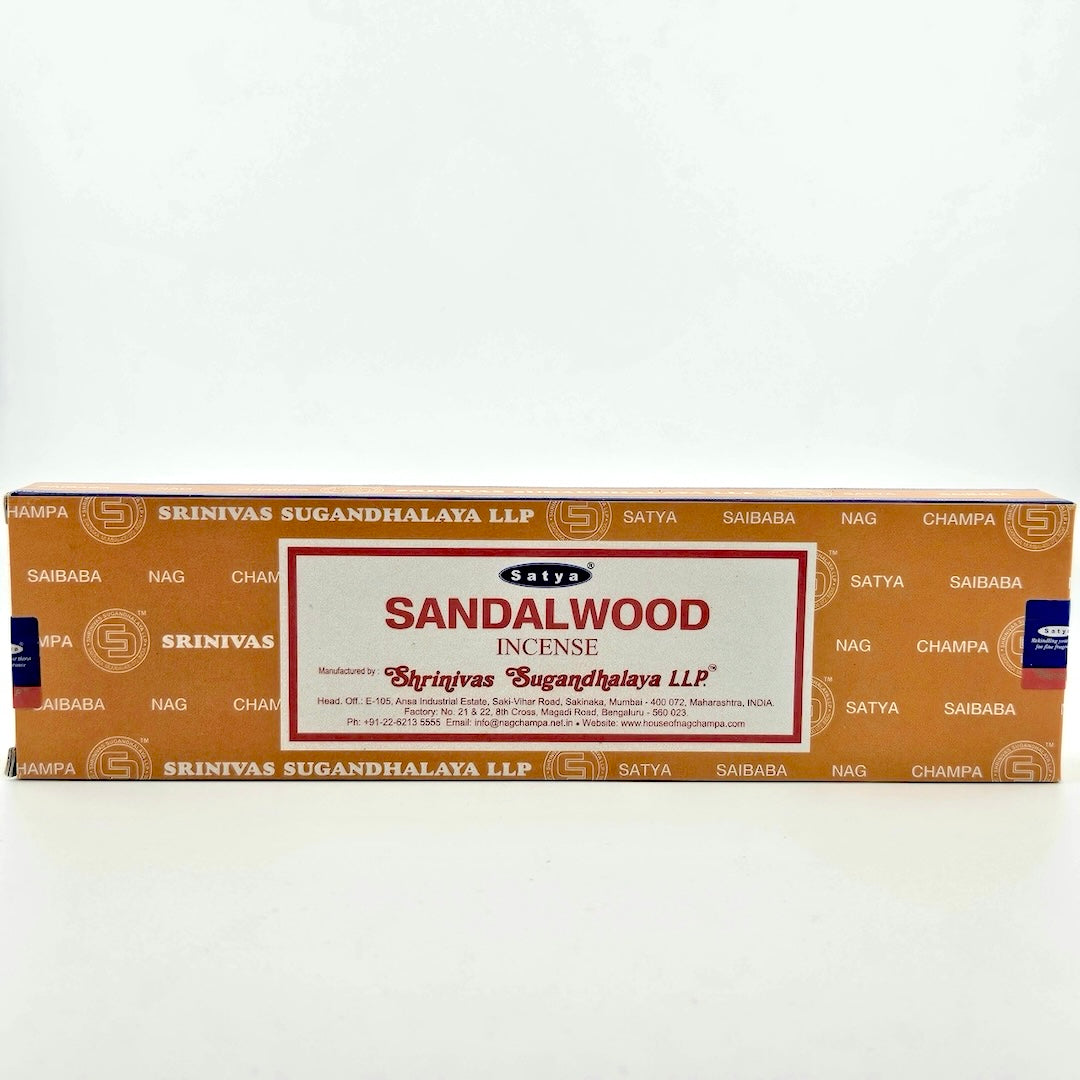 Orange box with white printed company name with white label with red border & printed product details.