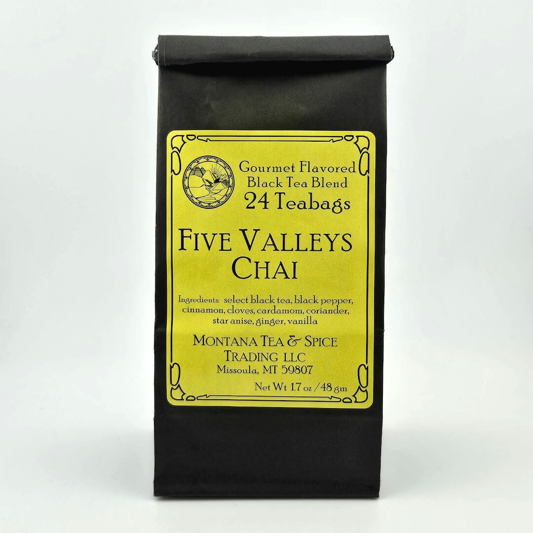 Black paper bag with rolled top with yellow label describing flavor and ingredients.