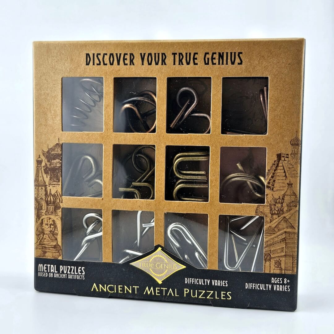 Box of ancient metal puzzles with text 'Discover Your True Genius' on a white background