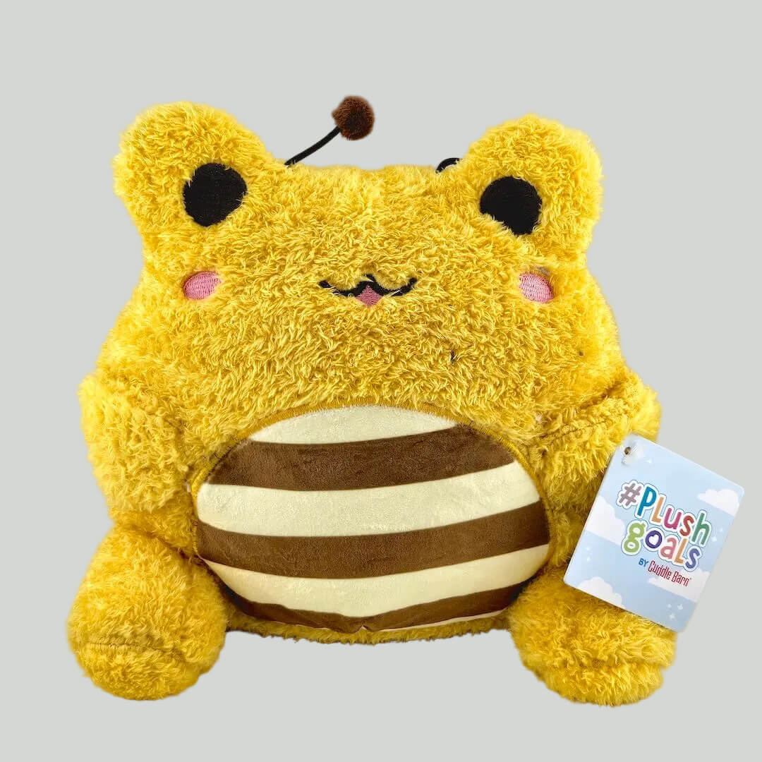 Yellow plush toy with a striped body on a white background, featuring a 'Plush Goals' tag.