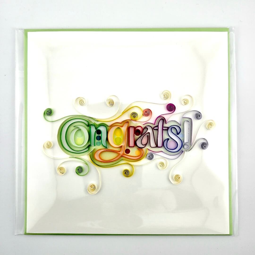 Colorful 'Congrats!' card with decorative elements on a white background