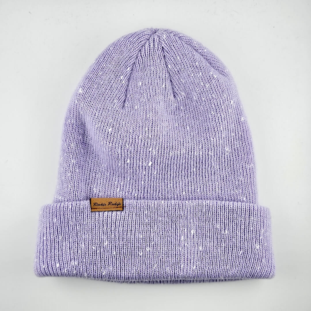 Purple knit beanie with a brand label on a light gray background