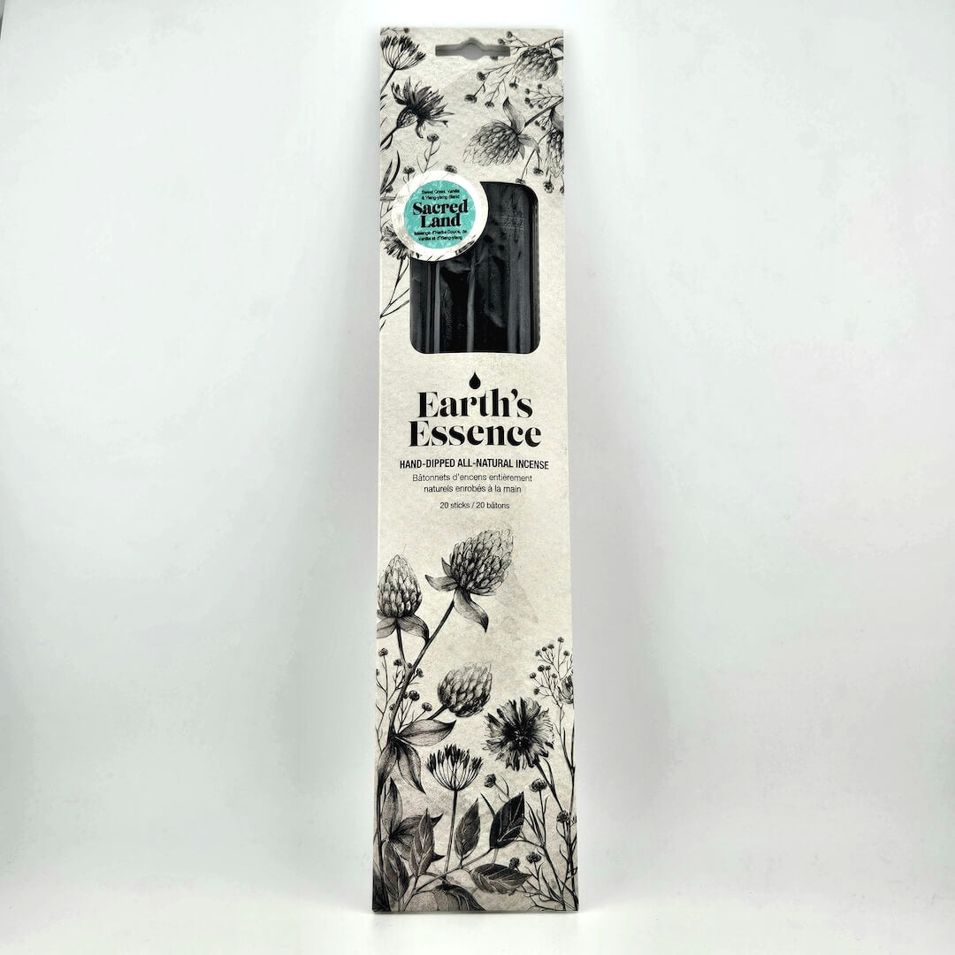 Box of Earth's Essence incense with botanical design on a white background