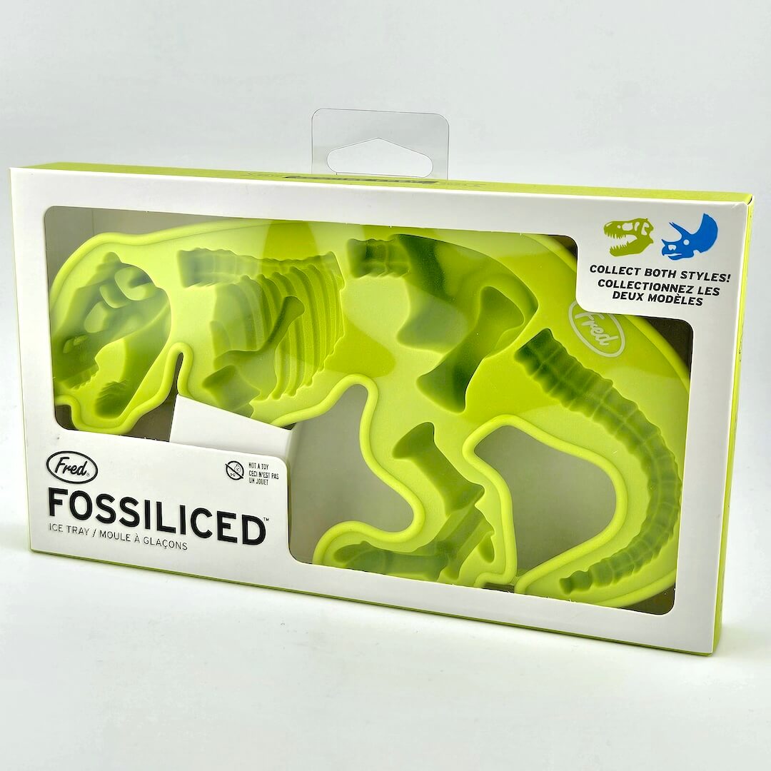 Fossil-themed ice tray packaging with green dinosaur skeleton design on a white background