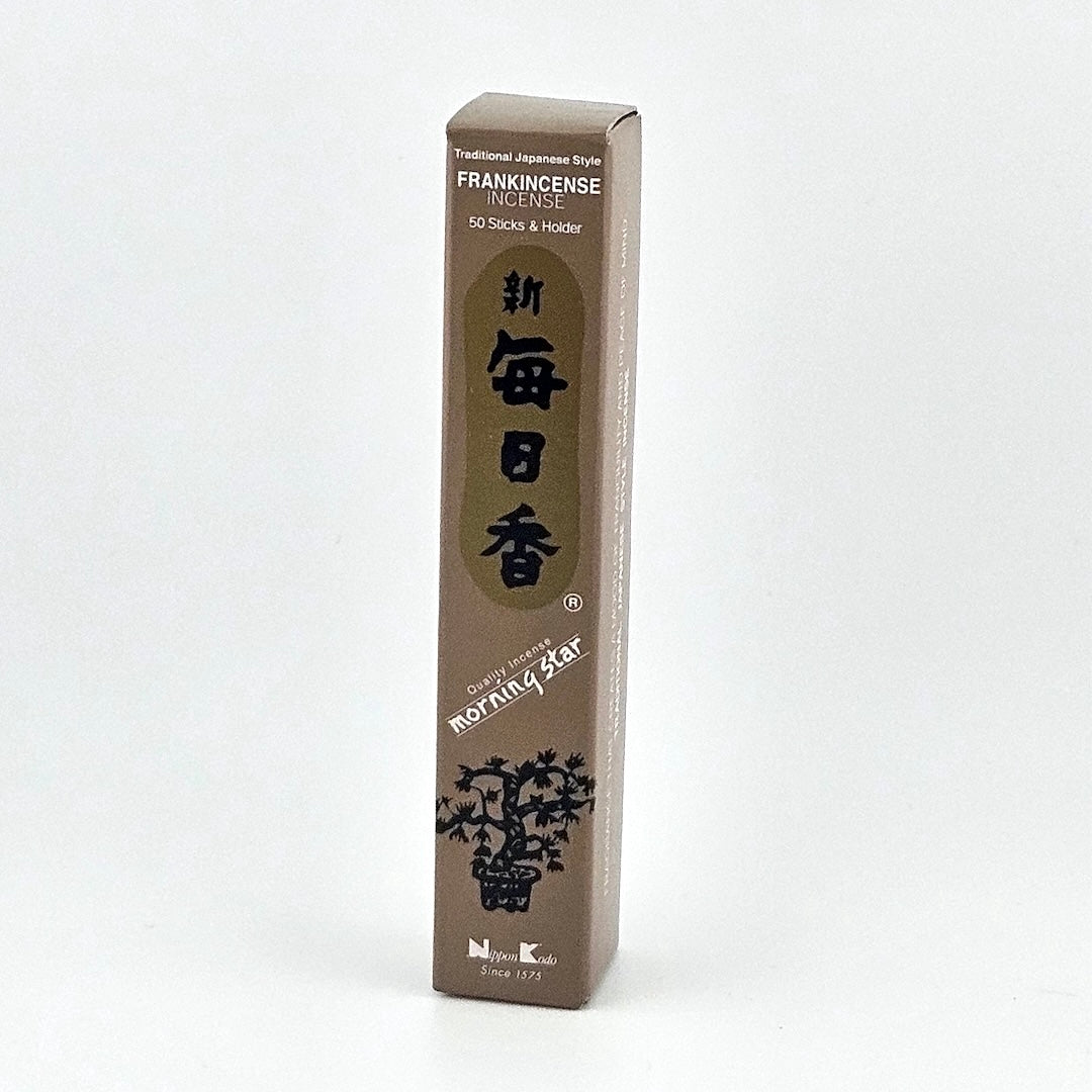 brown box of 50 incense sticks with Japanese writing above bonsai tree packaging on gray background.