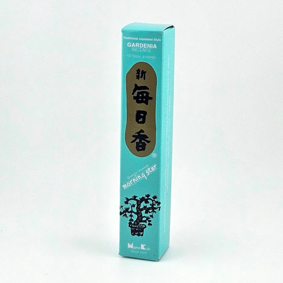 cyan box of 50 incense sticks with Japanese writing above bonsai tree packaging on gray background.