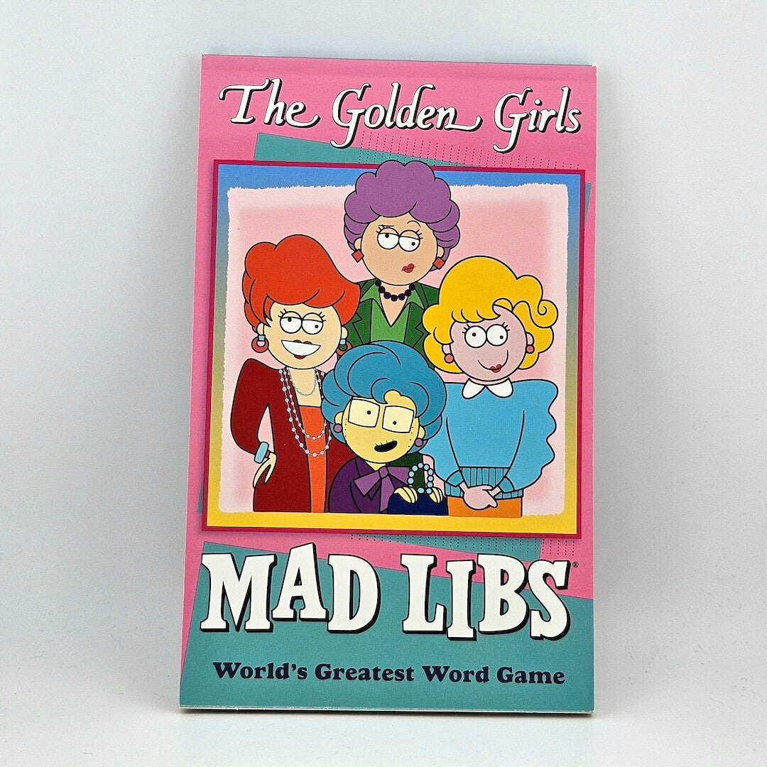 Book titled 'The Golden Girls Mad Libs' with cartoon characters on a pink and blue background