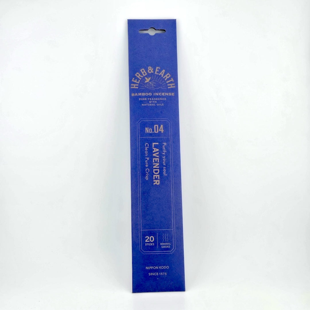 Royal blue rectangular package of incense with brown text describing product.