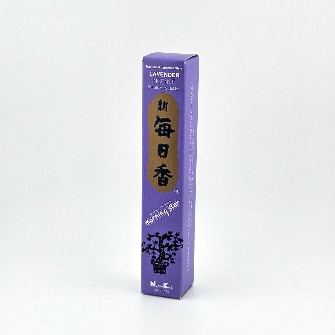 purple box of 50 incense sticks with Japanese writing above bonsai tree packaging on gray background.