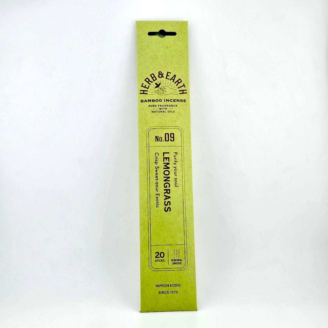 Light green rectangular package of incense with brown text describing product.