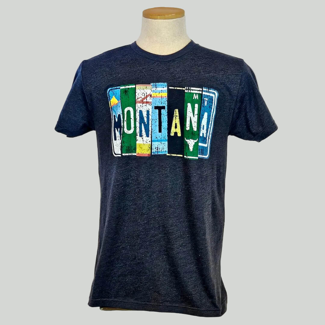 Navy blue t-shirt with 'Montana' design on a mannequin against a white background