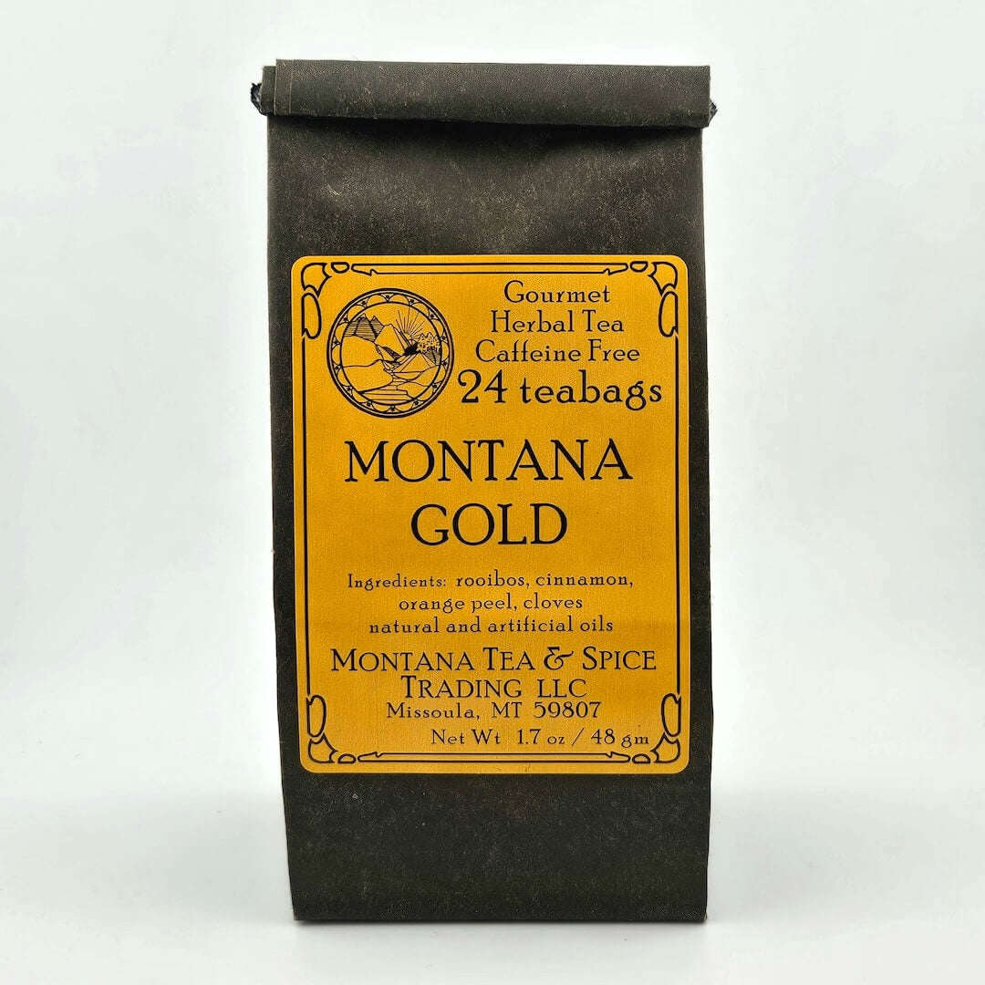 Black paper bag with rolled top with golden-yellow label describing flavor and ingredients.
