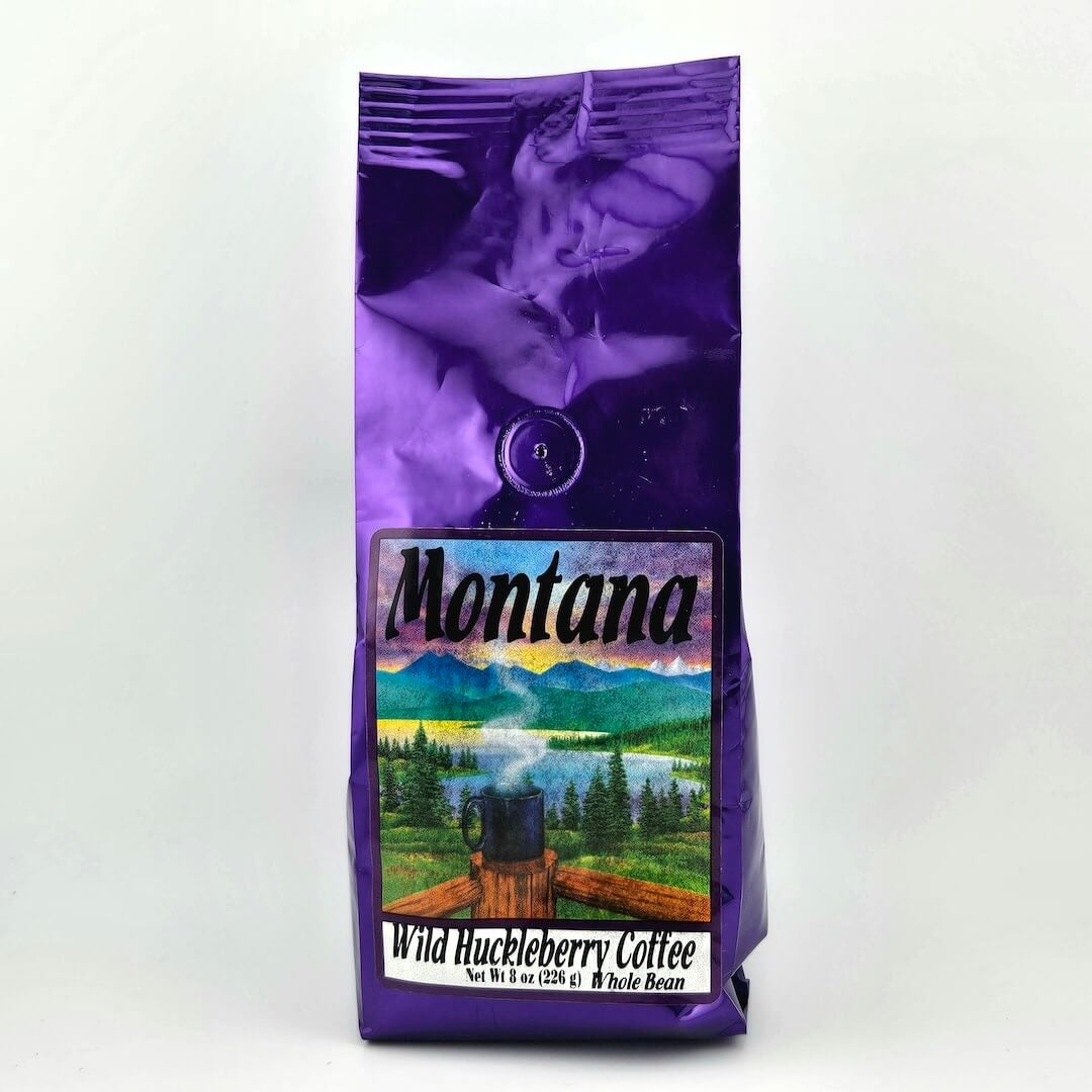 Montana Wild Huckleberry Coffee bag with scenic design on a white background