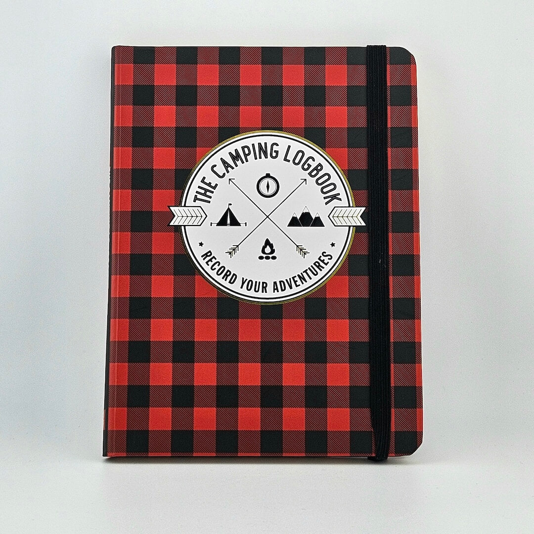 Red and black plaid notebook with circular emblem in center against white background.