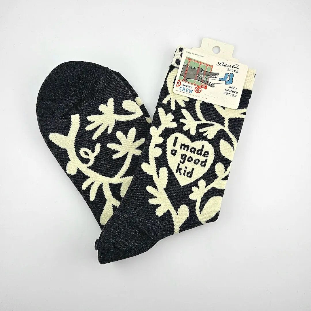 Black socks with white patterns and text on a white background