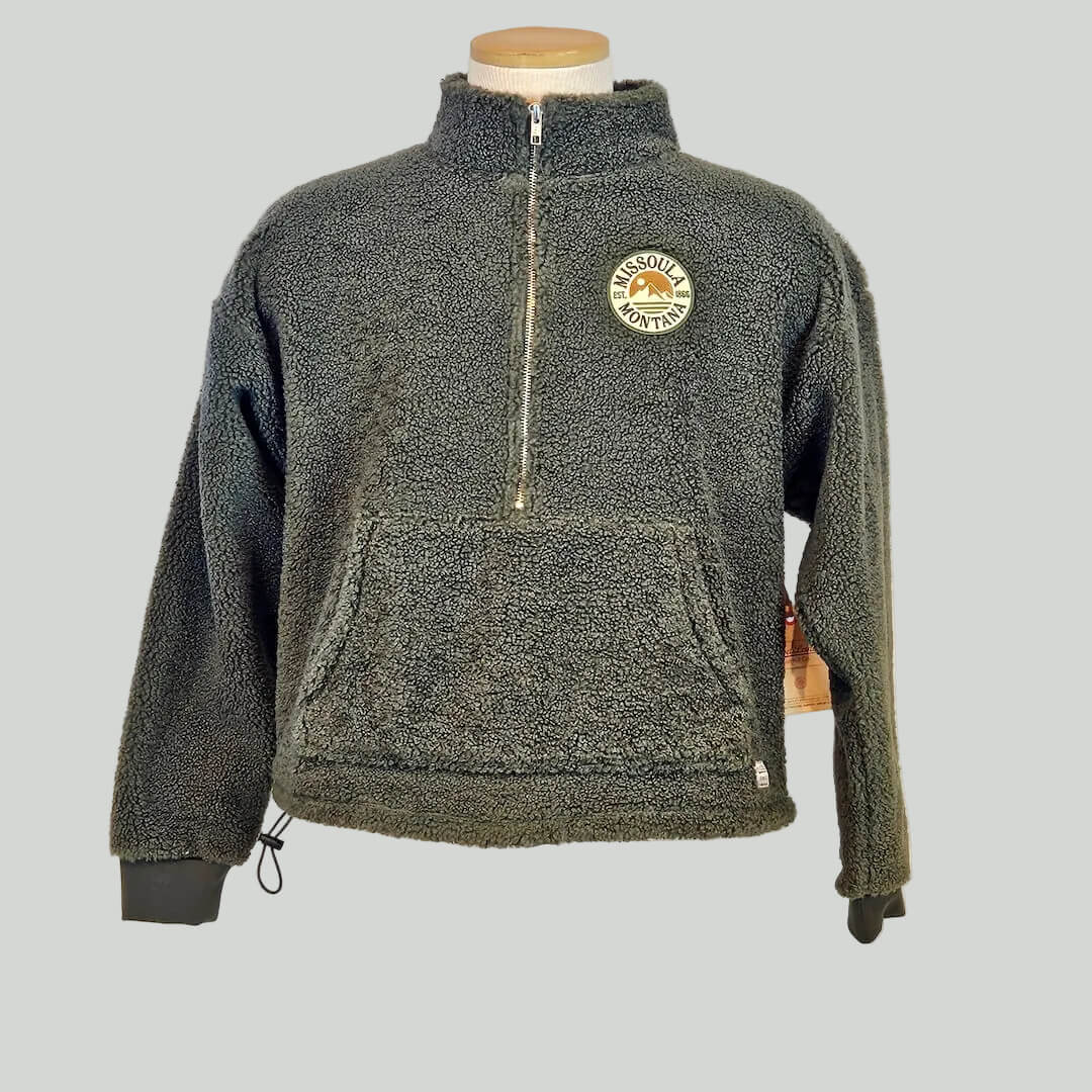 Green fleece pullover with a logo on a mannequin against a white background