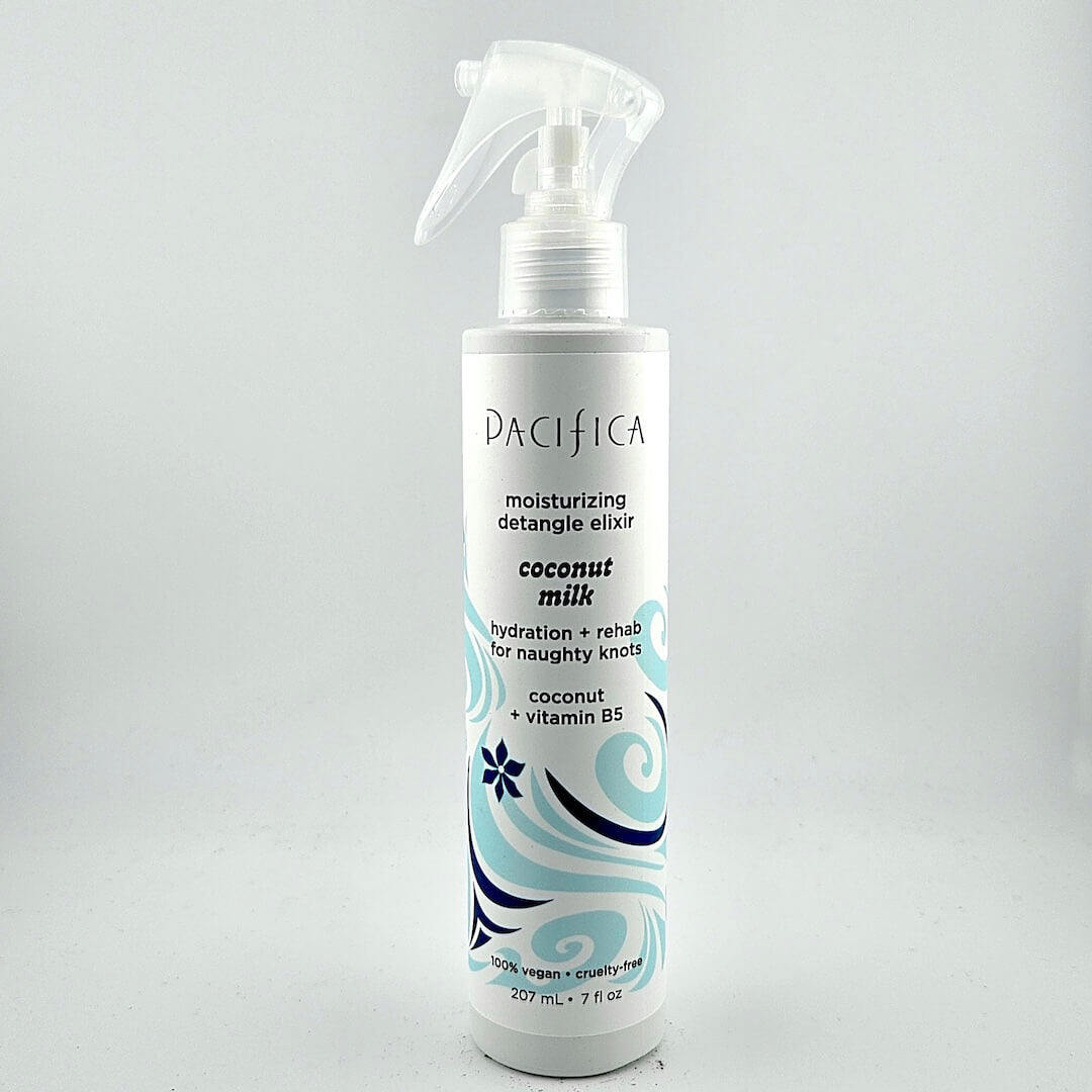 Pacifica coconut milk hair care product on a gray background