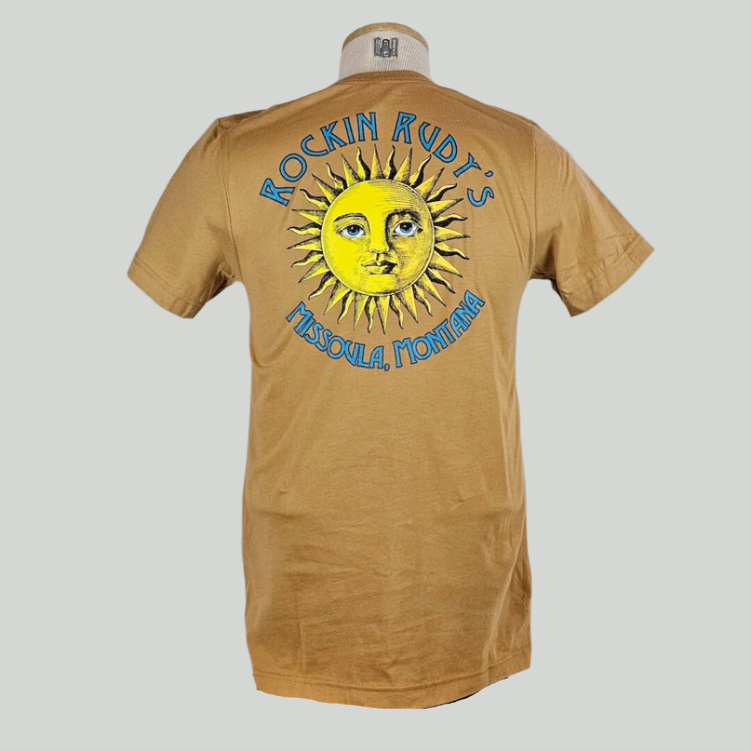 Carmel colored t-shirt with large sun in center with "ROCKIN RUDY'S" & "MISSOULA, MONTANA" encircling it.