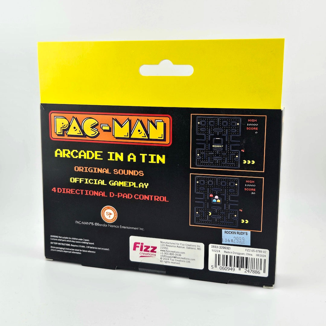 Pac-Man arcade game packaging with yellow and black design on a white background