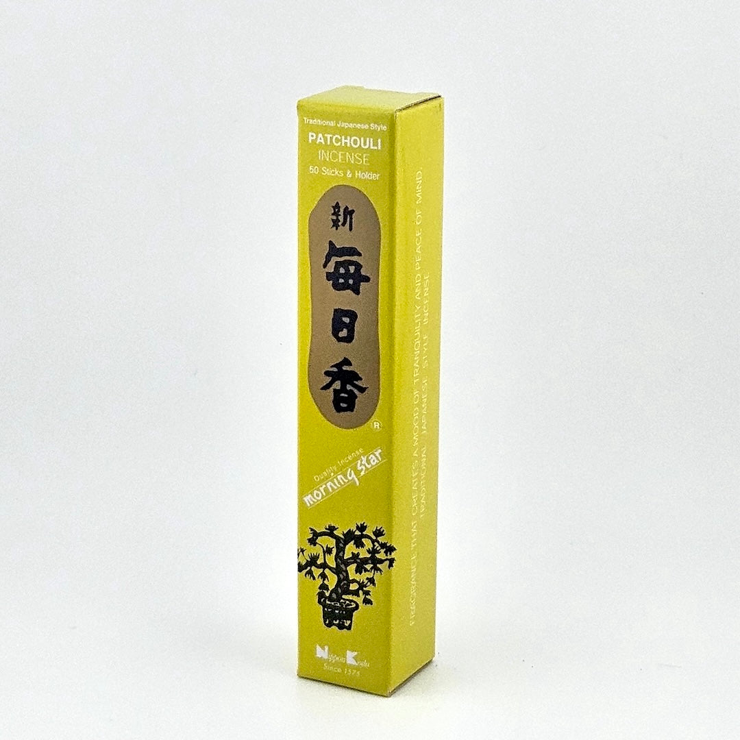 lime green box of 50 incense sticks with Japanese writing above bonsai tree packaging on gray background.