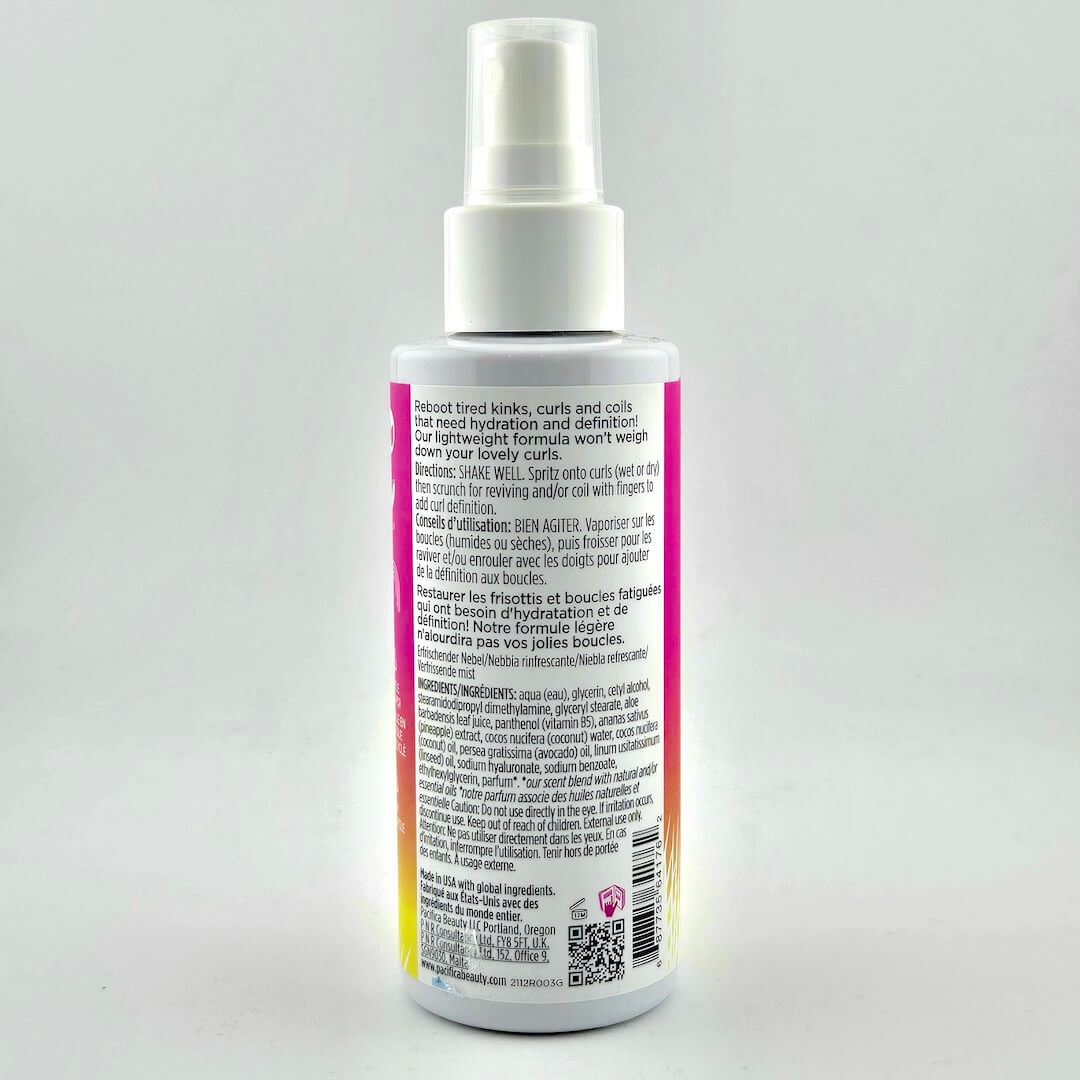 Backside of spray bottle with black text for instructions and ingredients with barcode against white background.