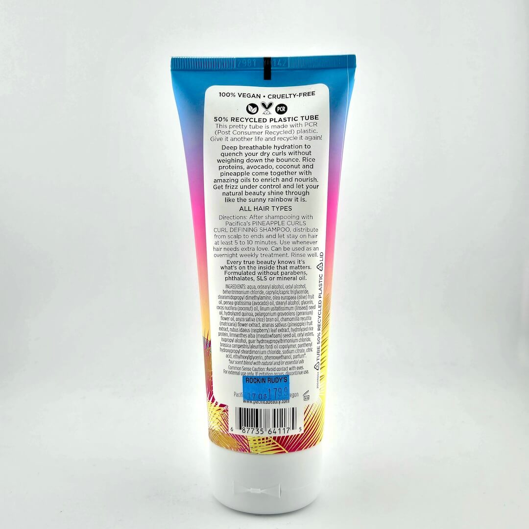 Backside of squeeze bottle with text for instructions and ingredients against white background.