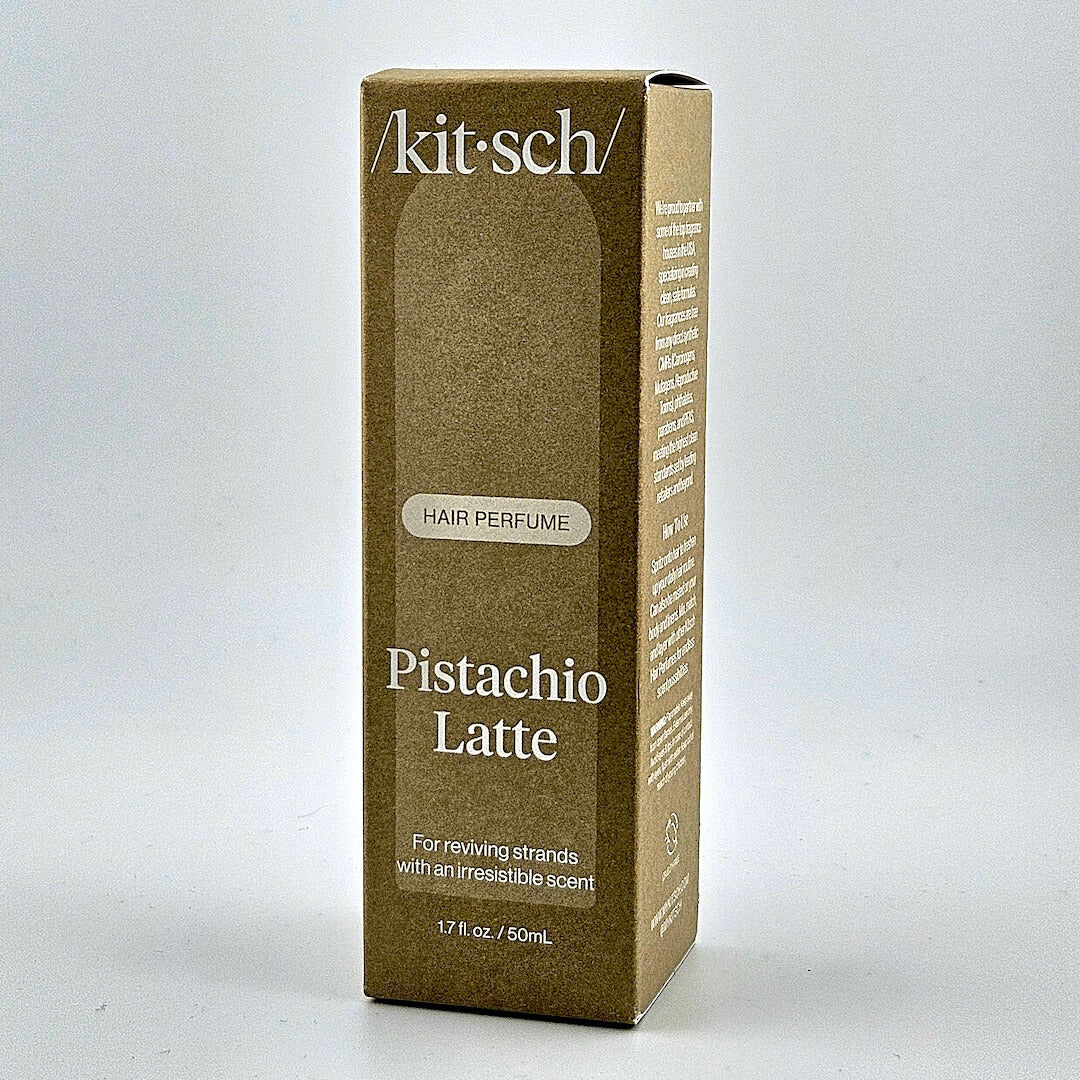 Brown packaging for hair perfume against white background.