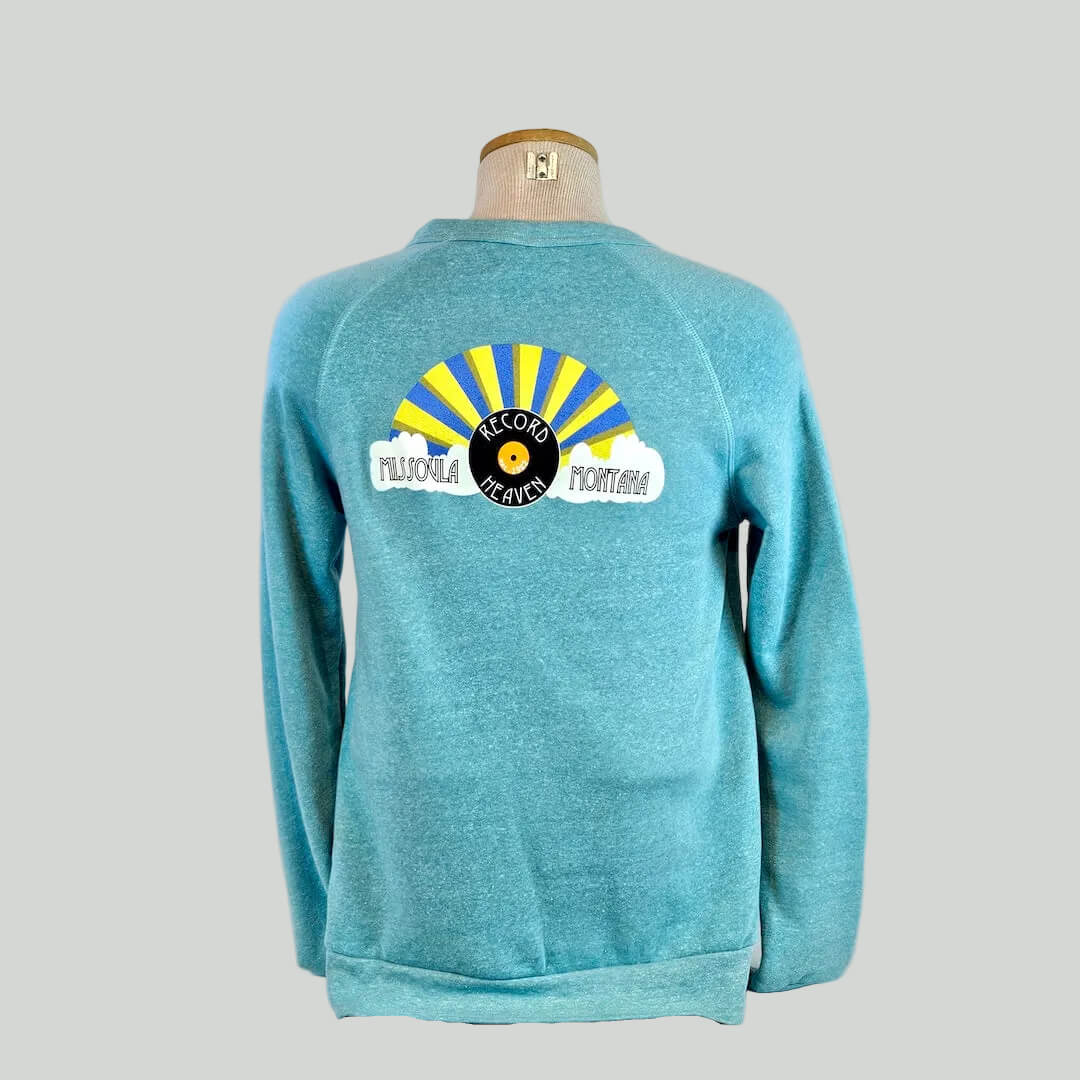 Blue sweatshirt with a logo on the back displayed on a mannequin against a white background