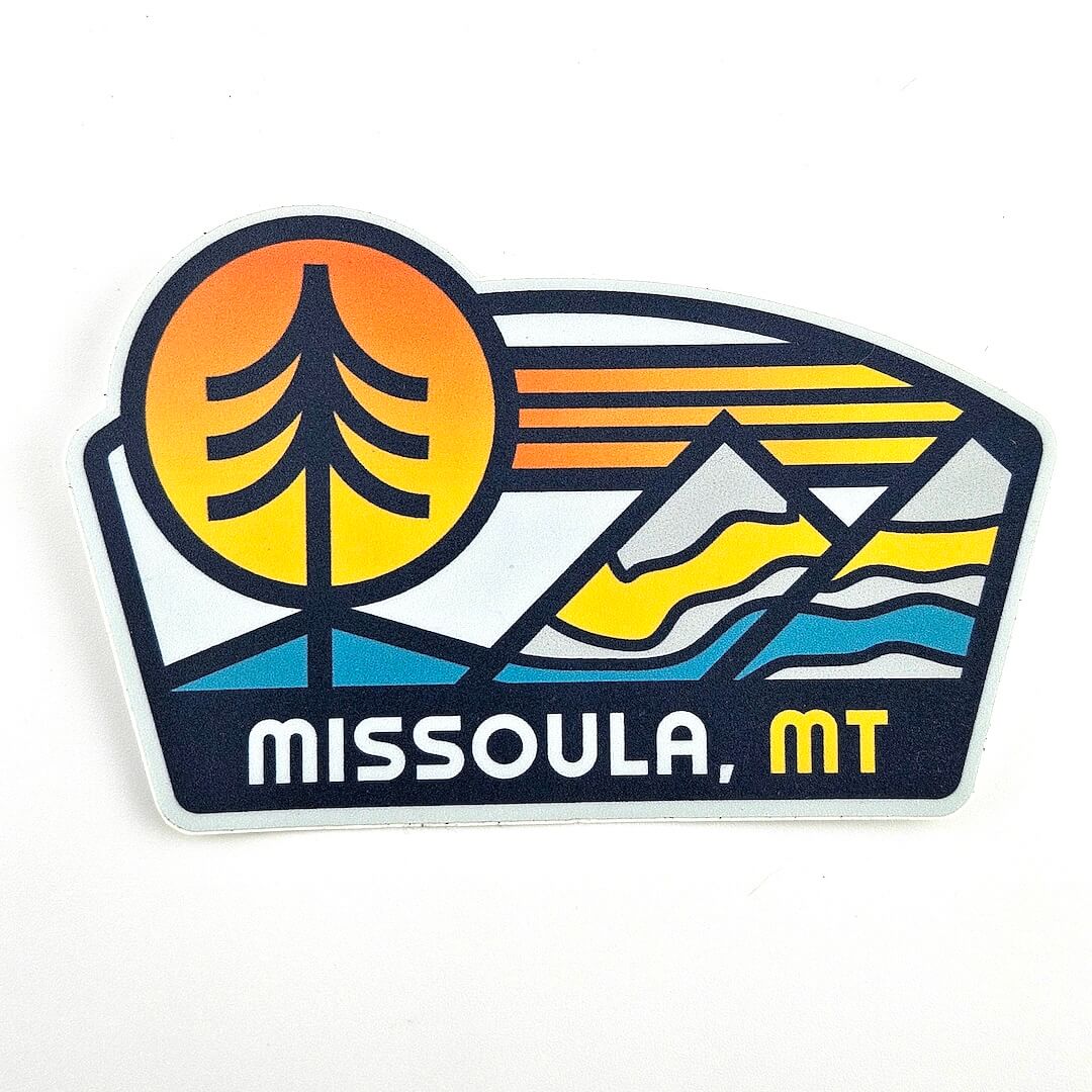 Sticker with a scenic design and 'Missoula, MT' text on a white background
