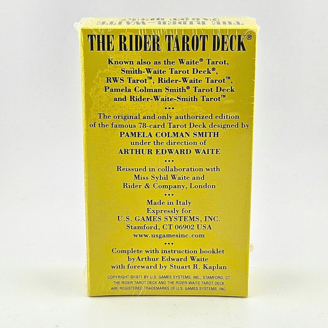 Back of yellow box with black text detailing artist and manufacturing information.