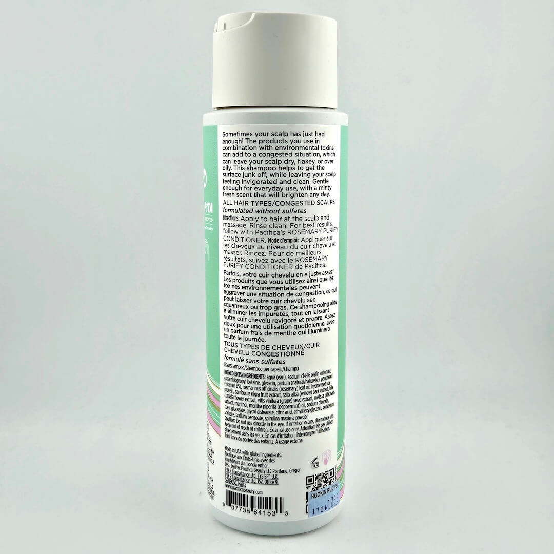 Back label of a shampoo bottle on a gray background