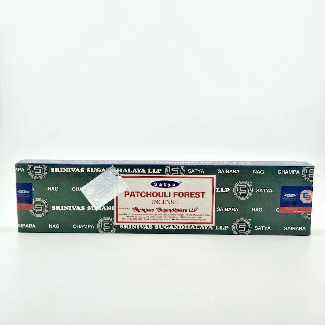 Green box printed with company name, white label with red border, next to silver holographic authentic sticker.