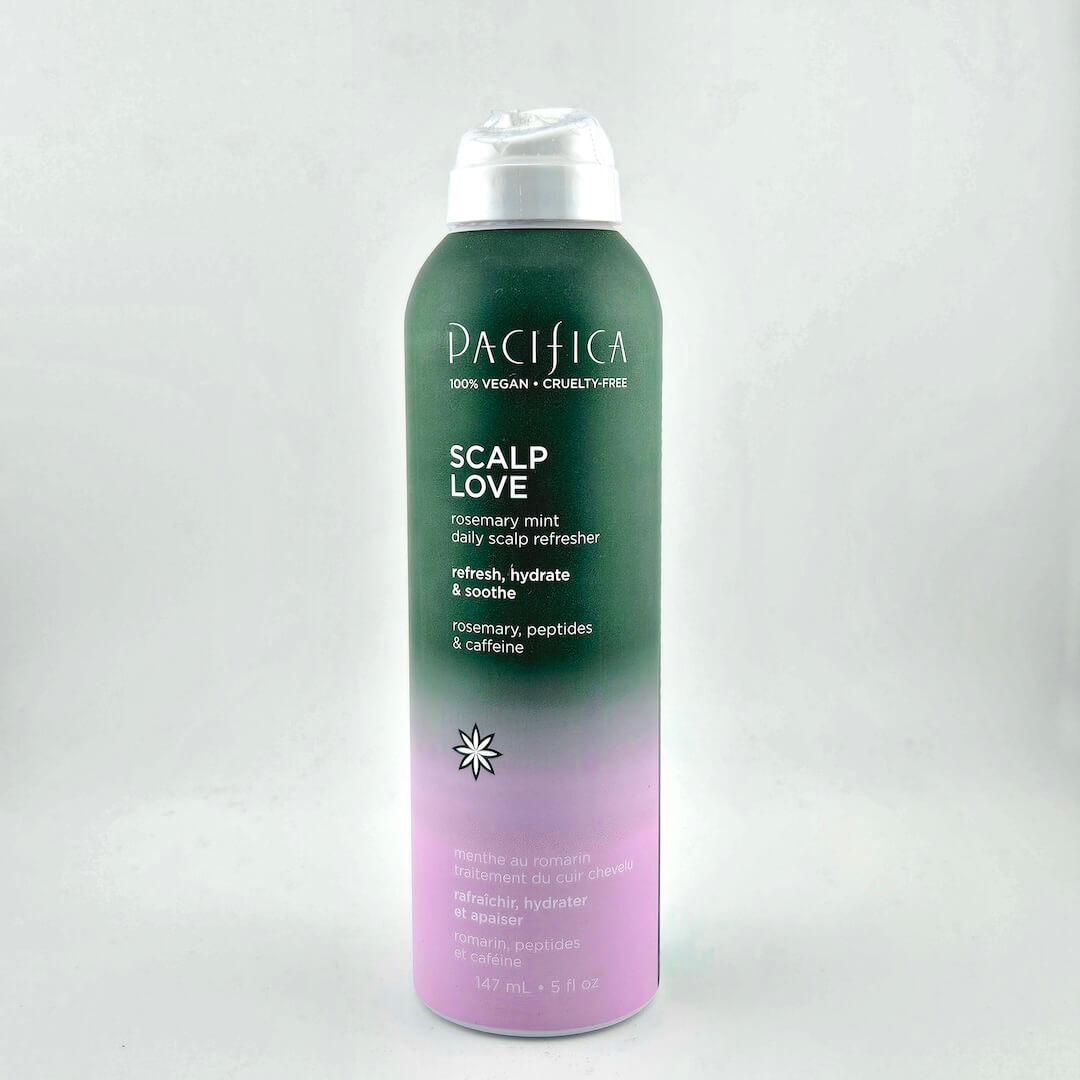Ombre aerosol can against white background.