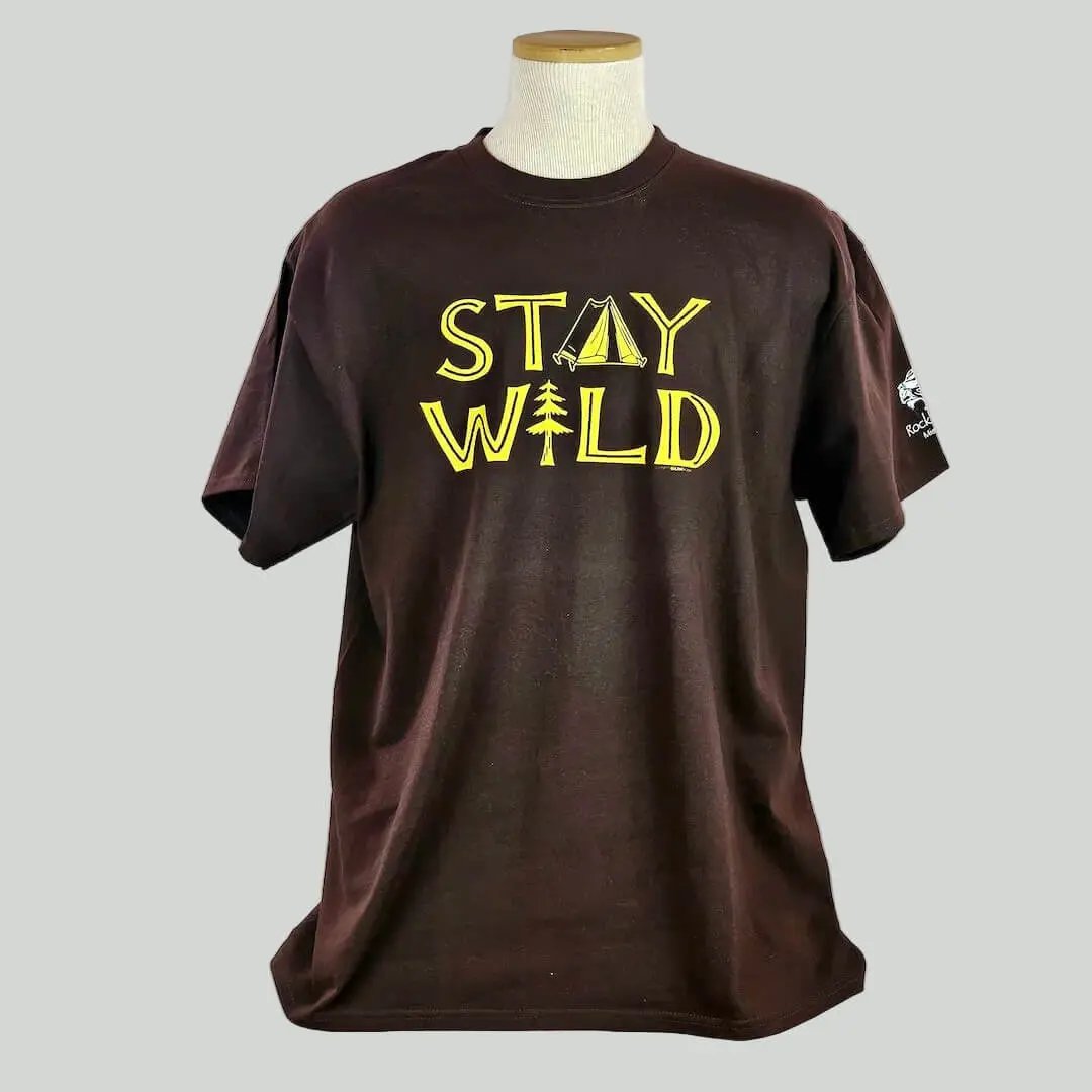 Brown t-shirt with 'Stay Wild' text on a mannequin against a white background