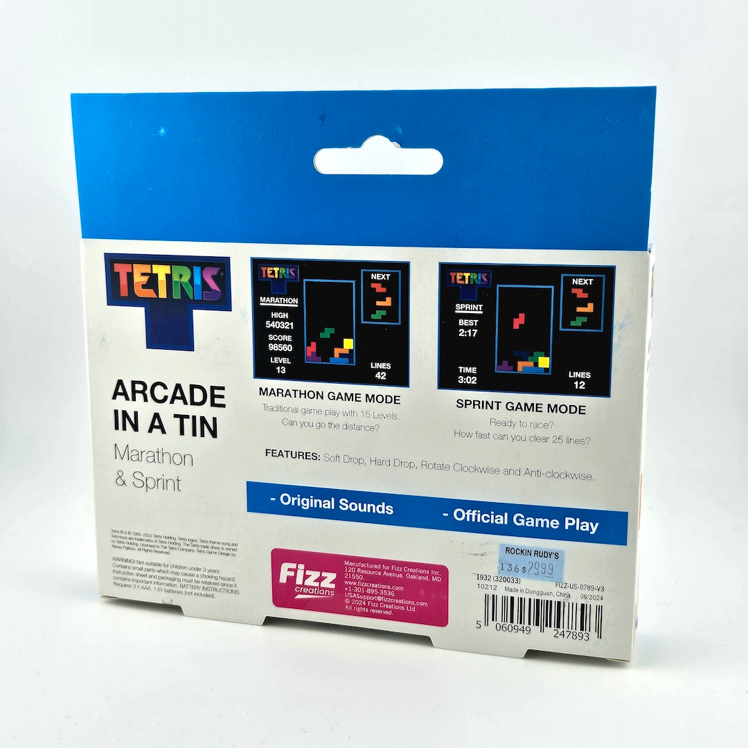 Tetris arcade game packaging with blue and white design