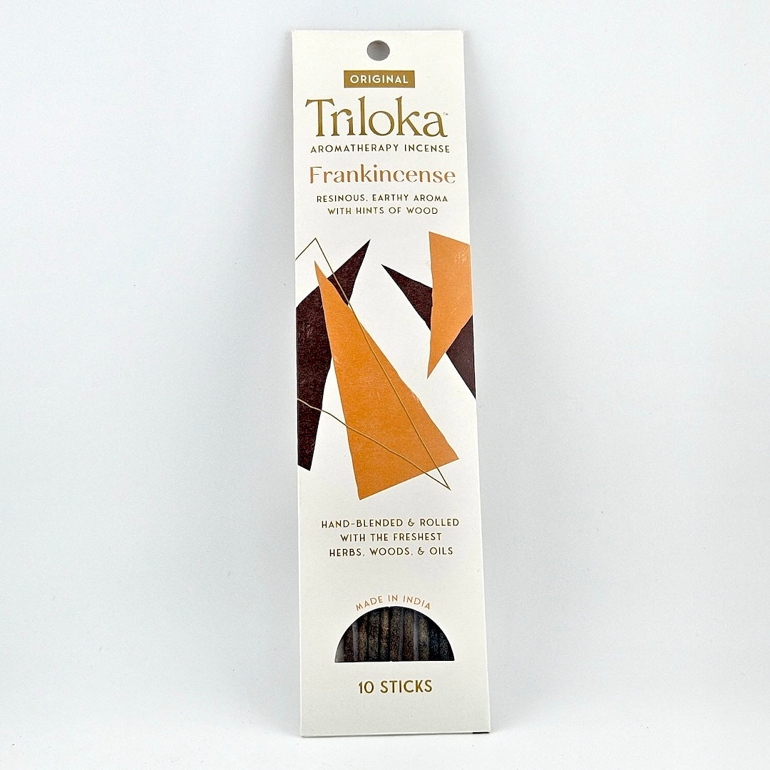 White rectangular package for 10 incense sticks, three leaves in center framed by product information.