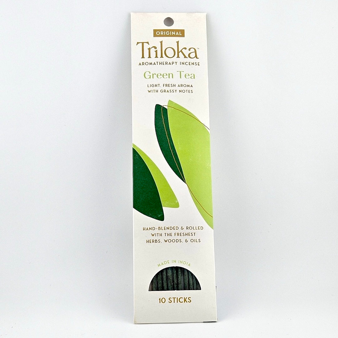 White rectangular package for 10 incense sticks, four leaves in center framed by product information.