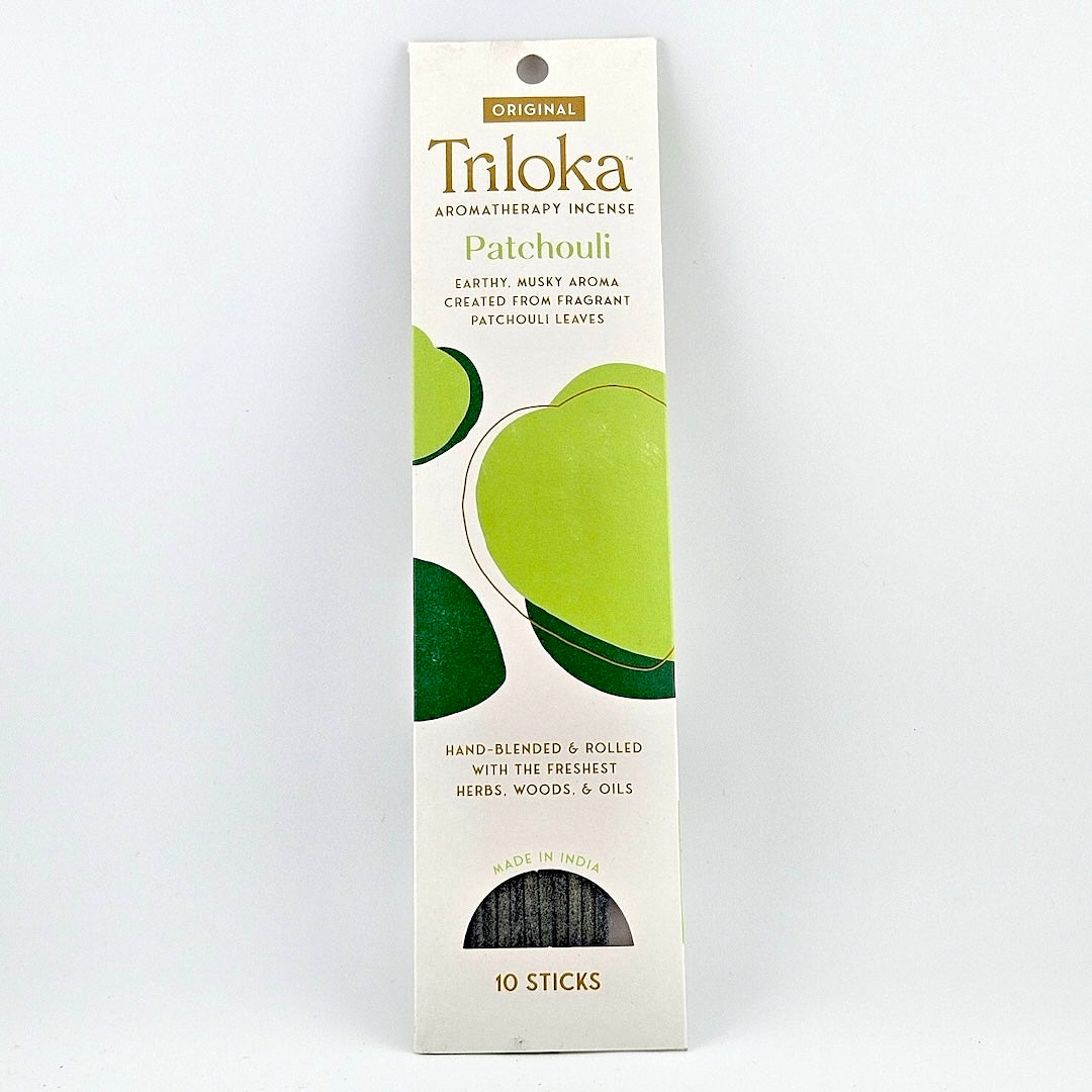 White rectangular package for 10 incense sticks, geometric graphics in center framed by product information.