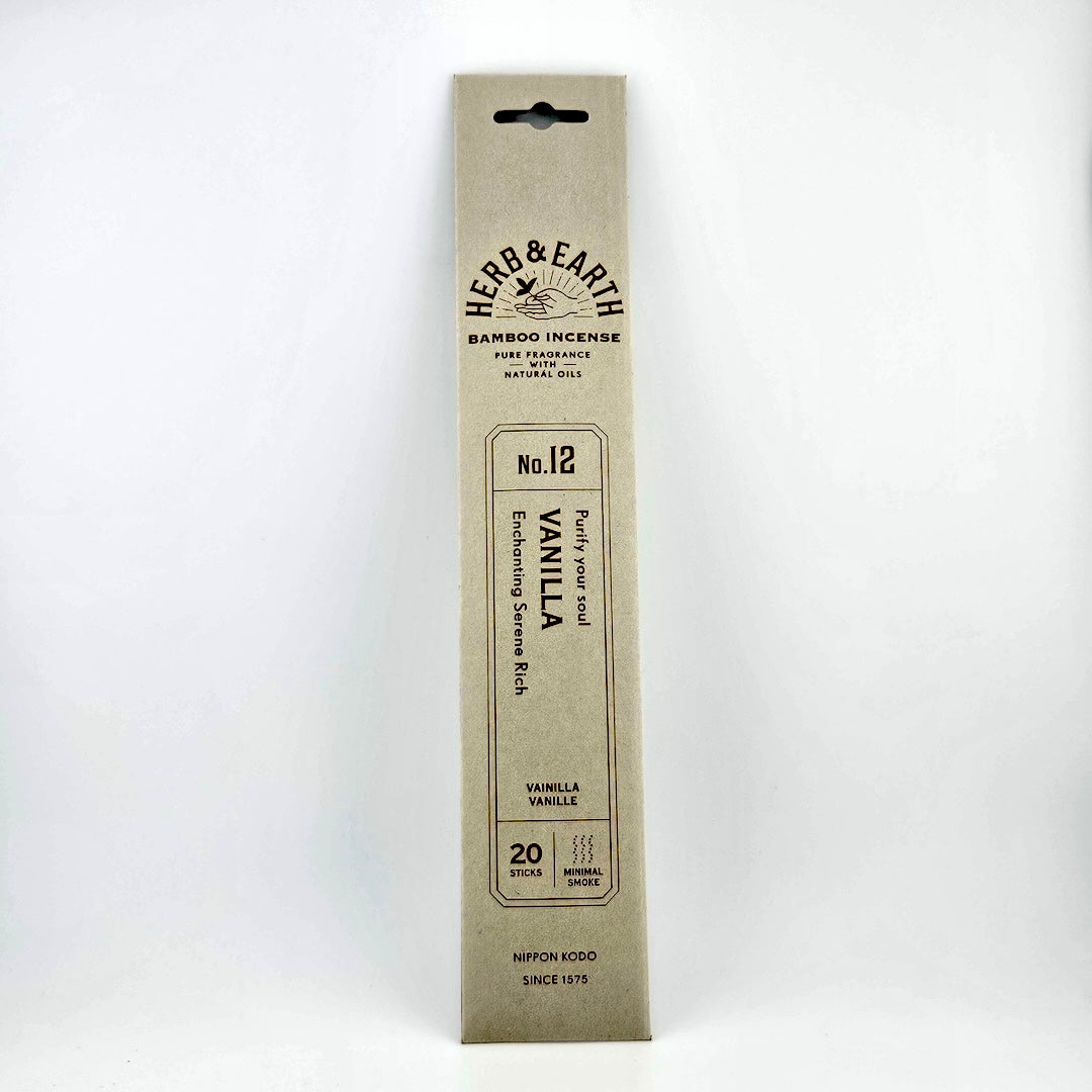 Gray rectangular package of incense with brown text describing product.