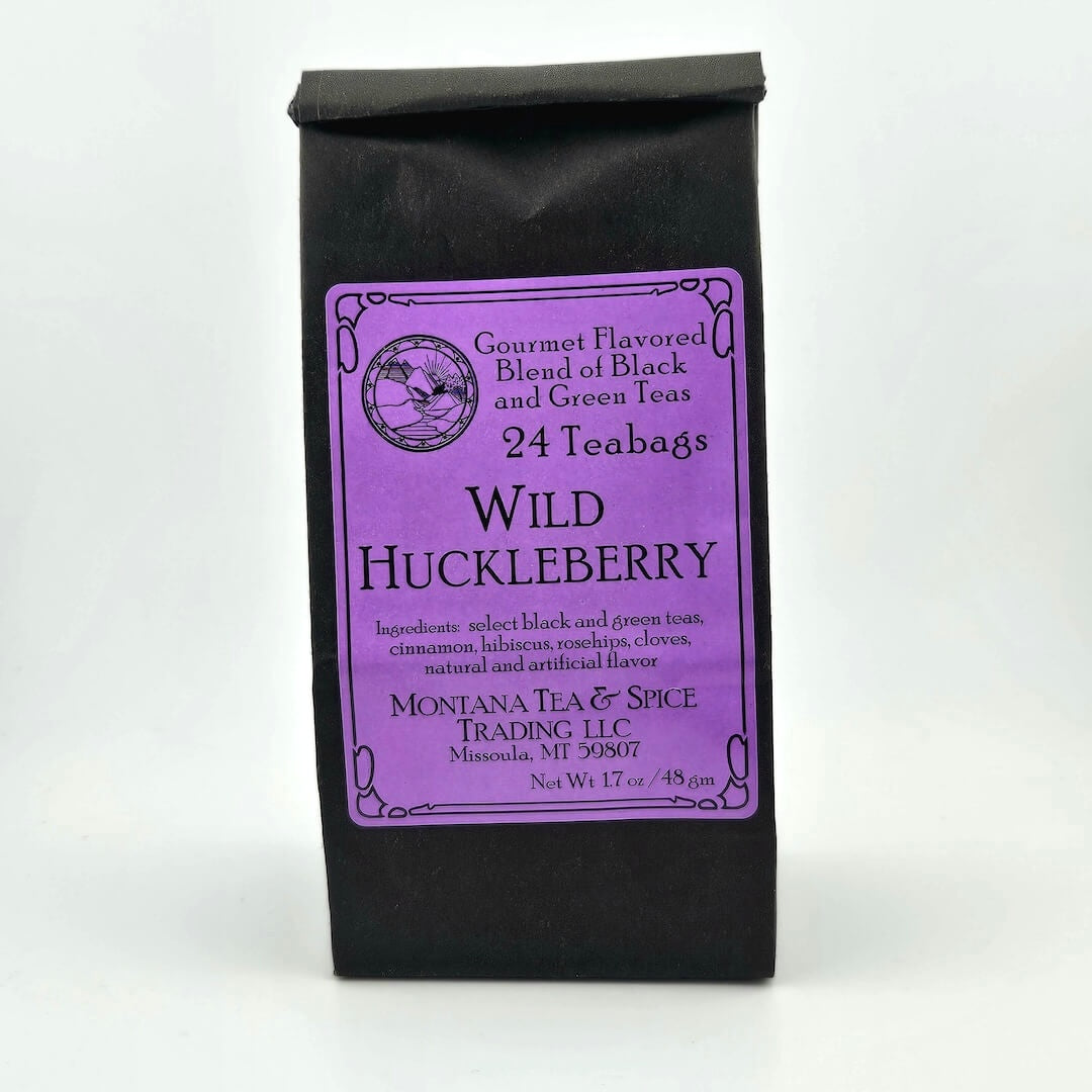 Black paper bag with rolled top with violet label describing flavor and ingredients.