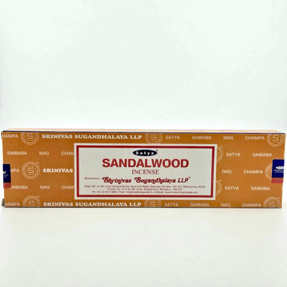 Orange box with white printed company name with white label with red border & printed product details.