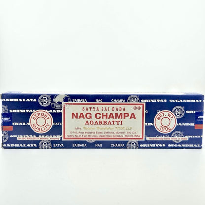 Blue box with white printed company name with white label with red border & printed product details.