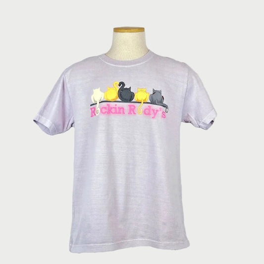 Light purple t-shirt with colorful duck design and 'Rockin Rudy's' text on a mannequin against a white background