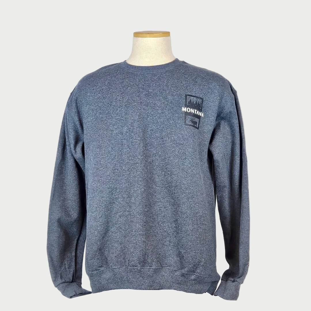 Blue sweatshirt with a 'Montana' logo on a mannequin against a white background
