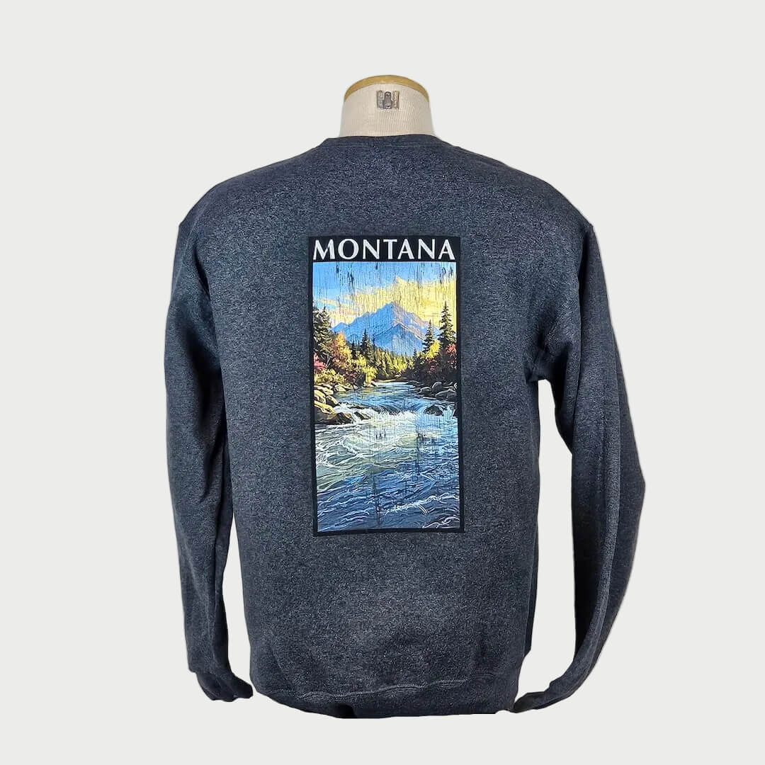 Blue sweatshirt with a mountain and river graphic on a mannequin against a white background