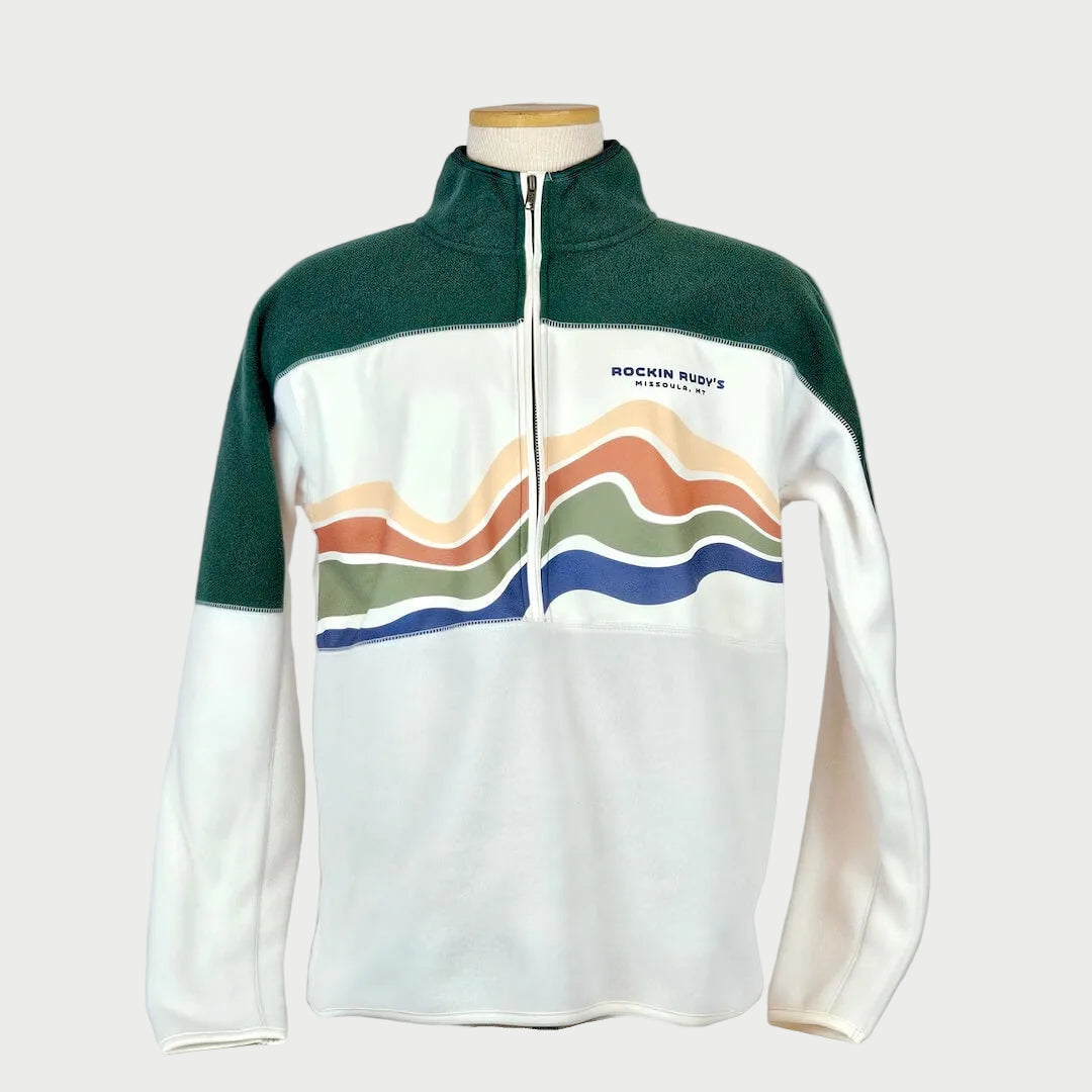 Green and white jacket with colorful wave pattern on a mannequin against a light gray background