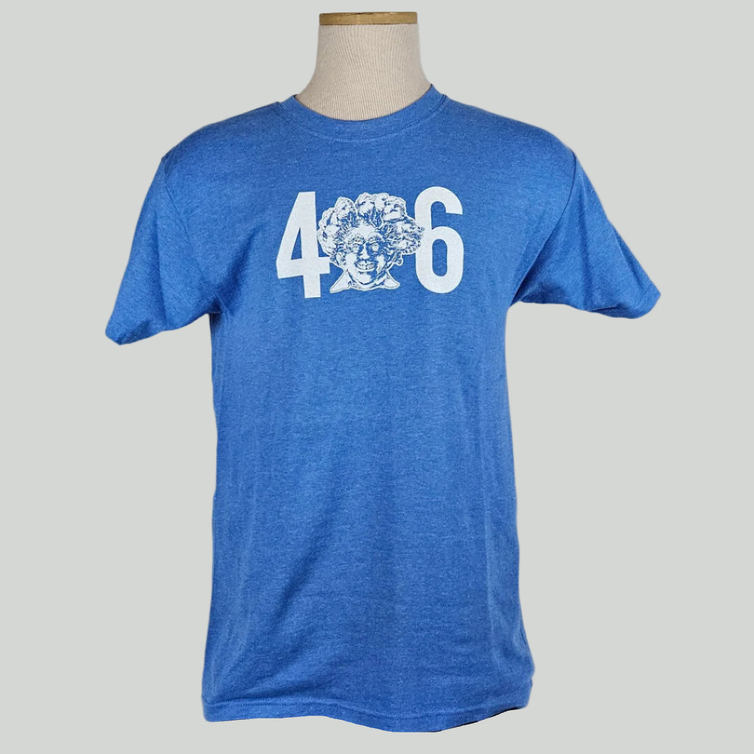 Blue t-shirt with white "406" across chest, in place of the "0" as bust of man with broccoli/trees for hair in sketch style