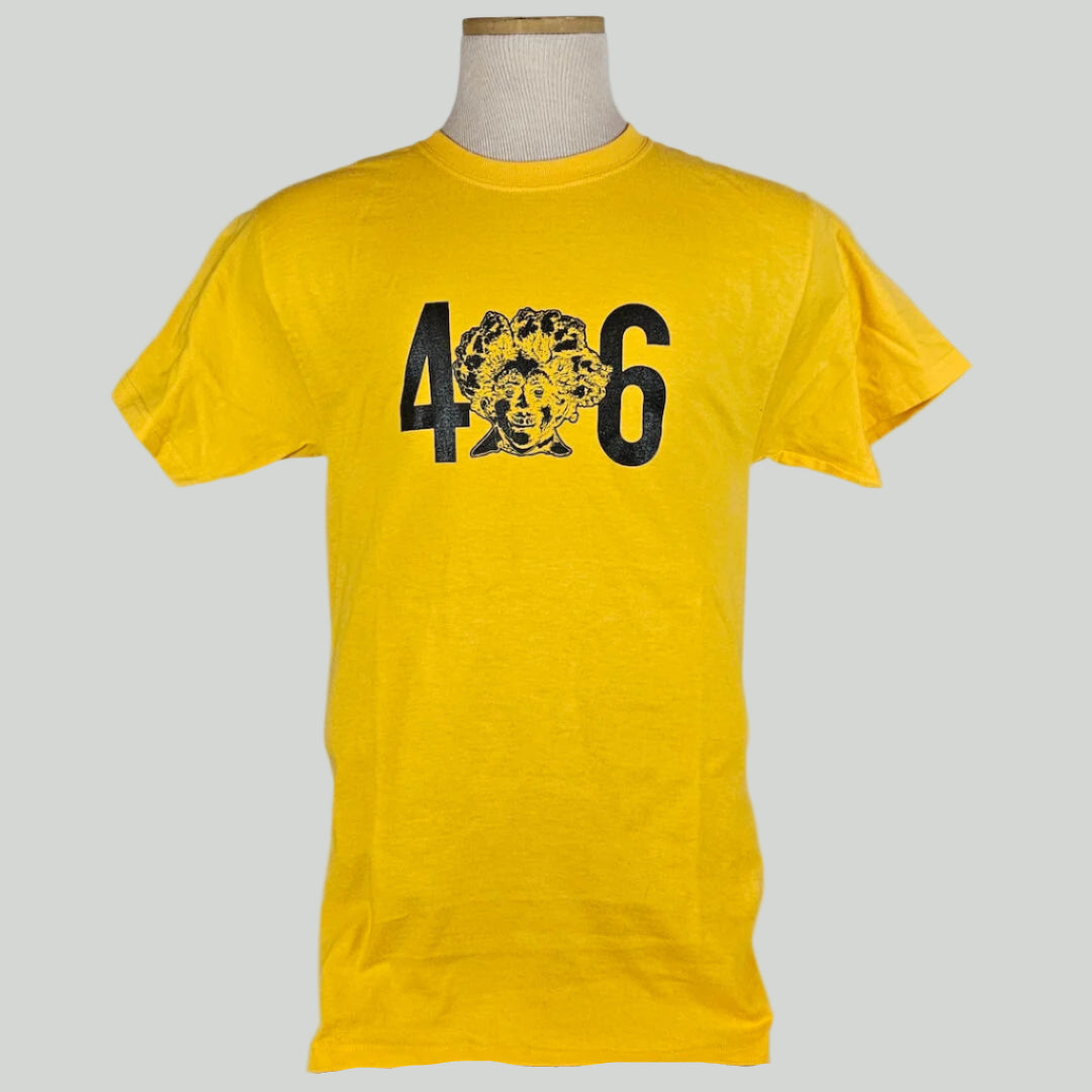 Yellow t-shirt with black "406" across chest, in place of the "0" as bust of man with broccoli/trees for hair in sketch style