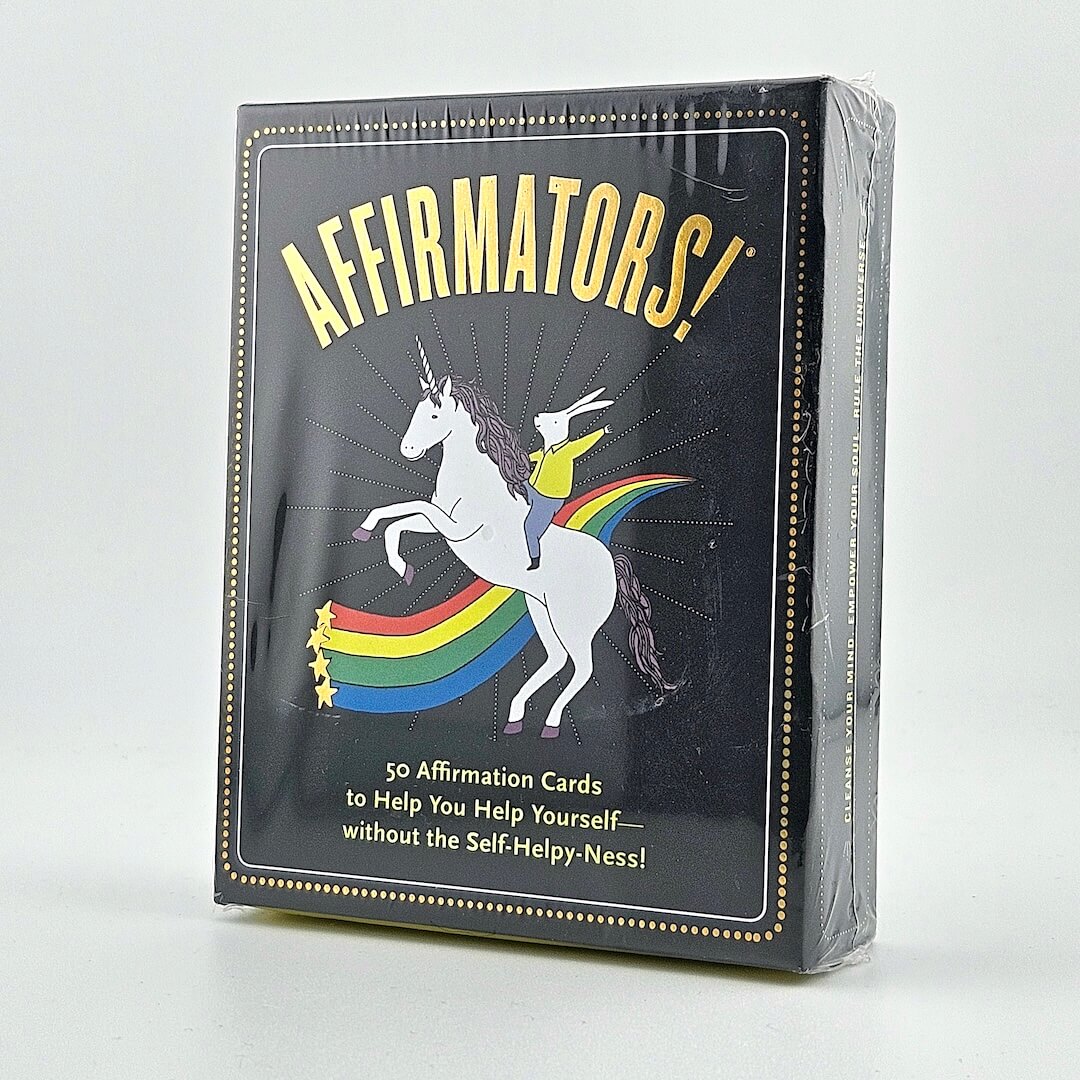 Packaged product with a unicorn and rainbow design on a white background