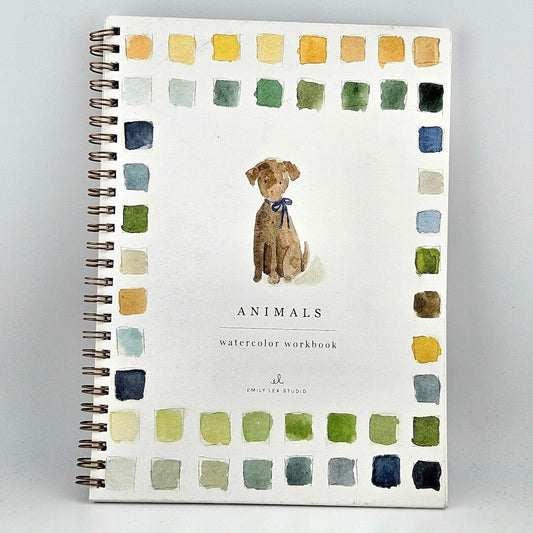 Notebook titled 'Animals Watercolor Workbook' with a dog illustration on a white background